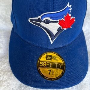 New men’s new era Royal Toronto Blue Jays. Size 71/4 - 57.7 cm